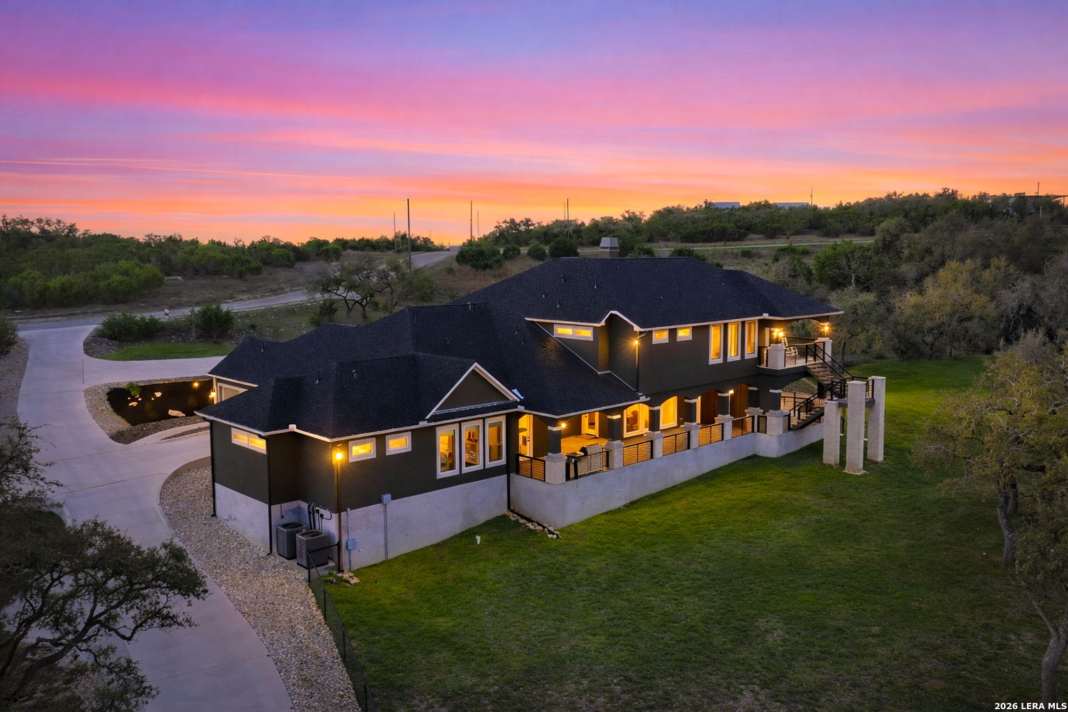 321 Vista View Place Spring Branch, TX 78070 - Photo 9 of 50 a view of a lake with a big yard