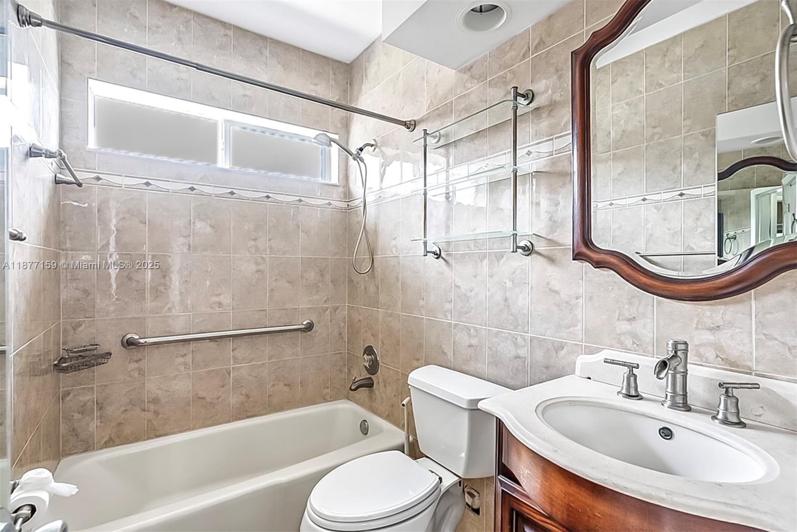 3568 Southwest 69th Way Miramar, FL 33023 - Photo 23 of 32 a bathroom with a sink toilet and shower