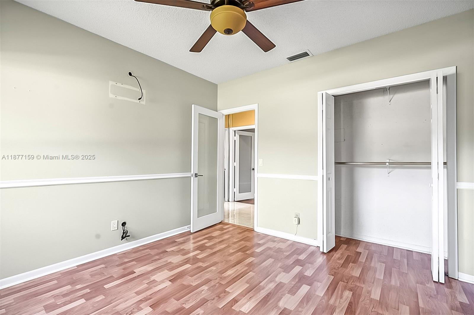 3568 Southwest 69th Way Miramar, FL 33023 - Photo 24 of 32 a view of empty room with wooden floor