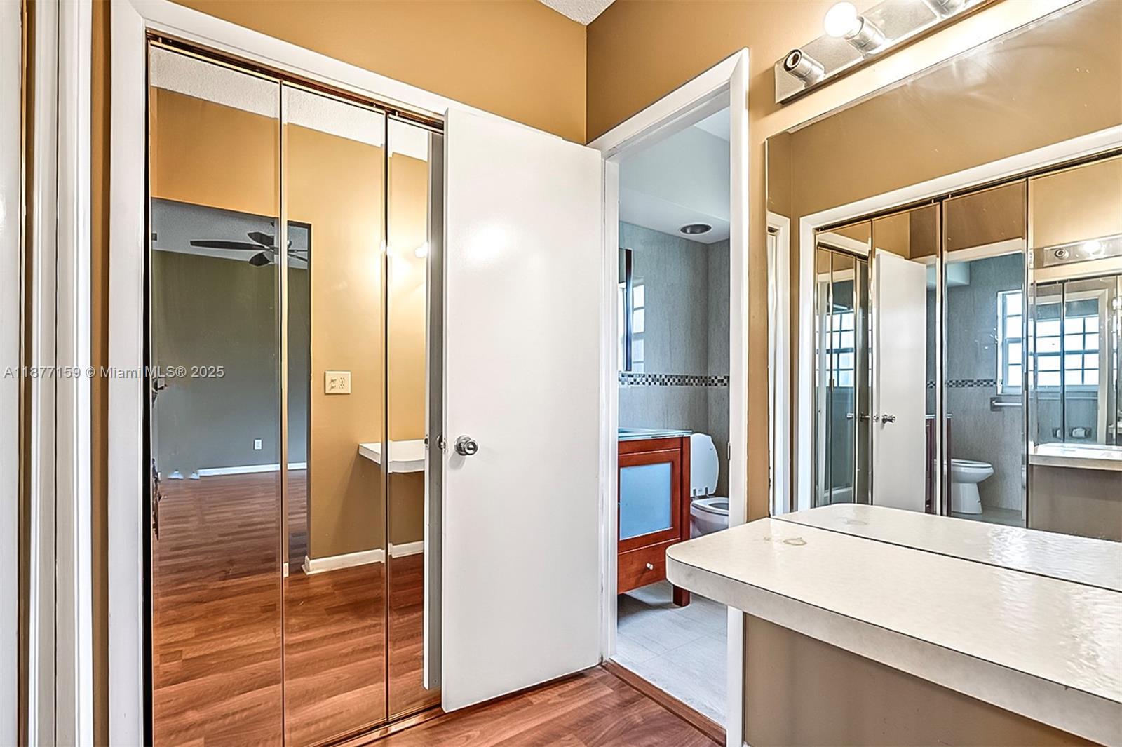 3568 Southwest 69th Way Miramar, FL 33023 - Photo 25 of 32 a bathroom with a sink and a mirror