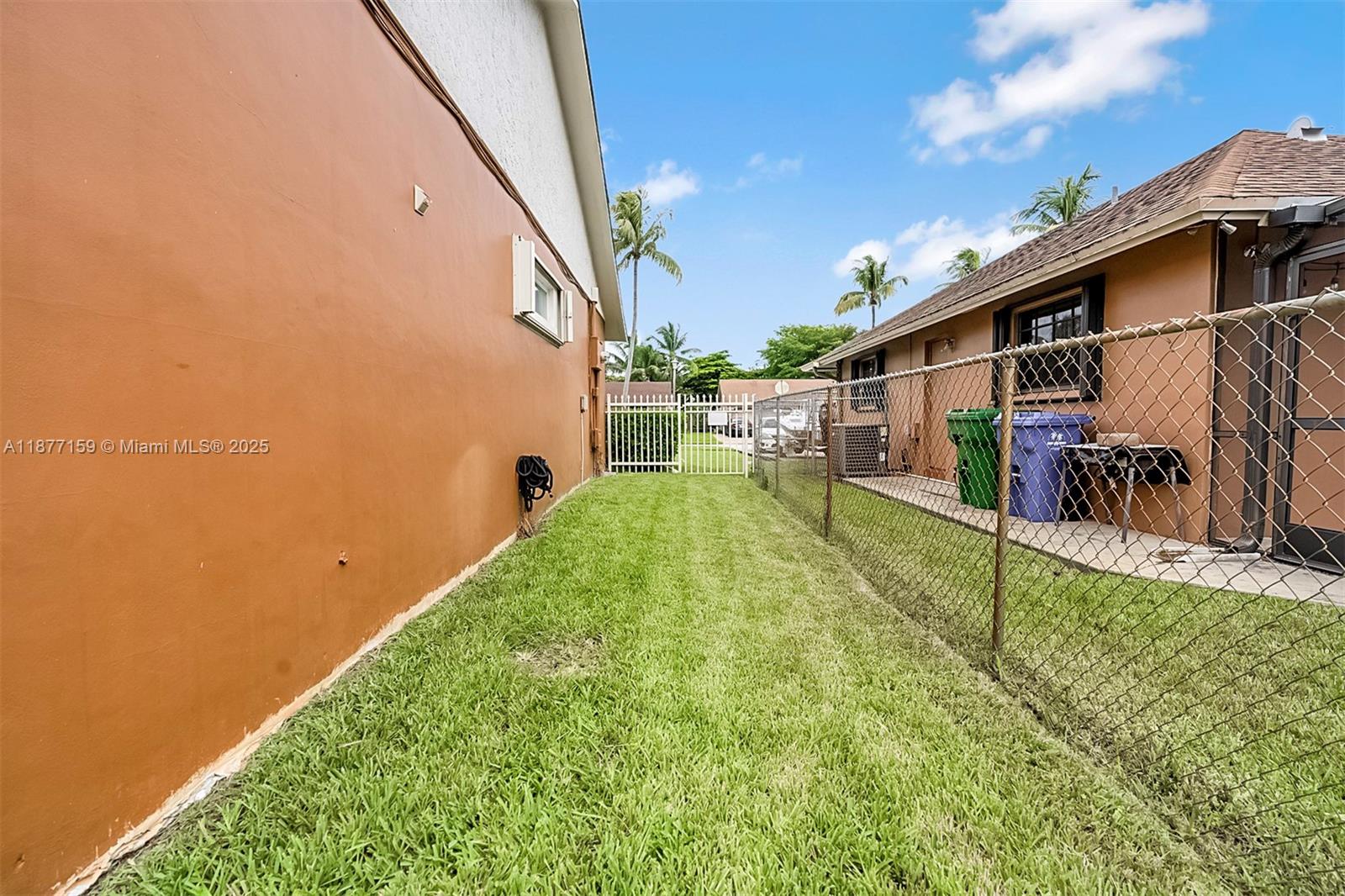 3568 Southwest 69th Way Miramar, FL 33023 - Photo 29 of 32 a view of a back yard of the house