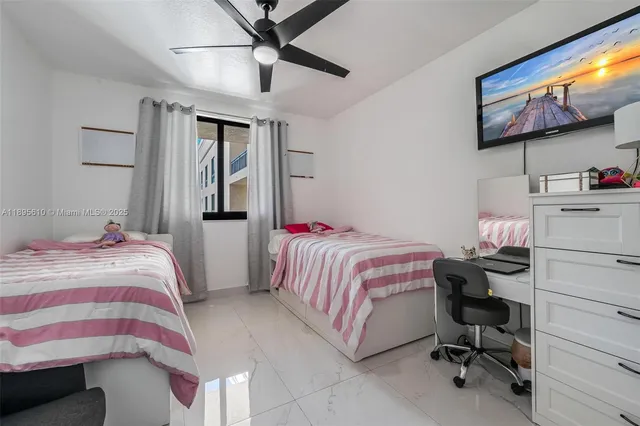 a bedroom with a bed and furniture