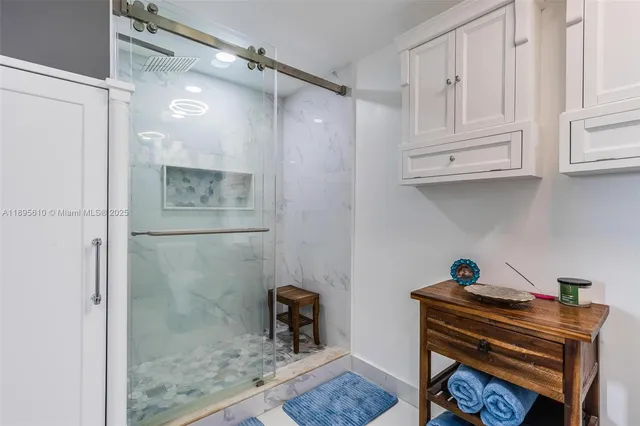 a room with cabinets and a wooden floor