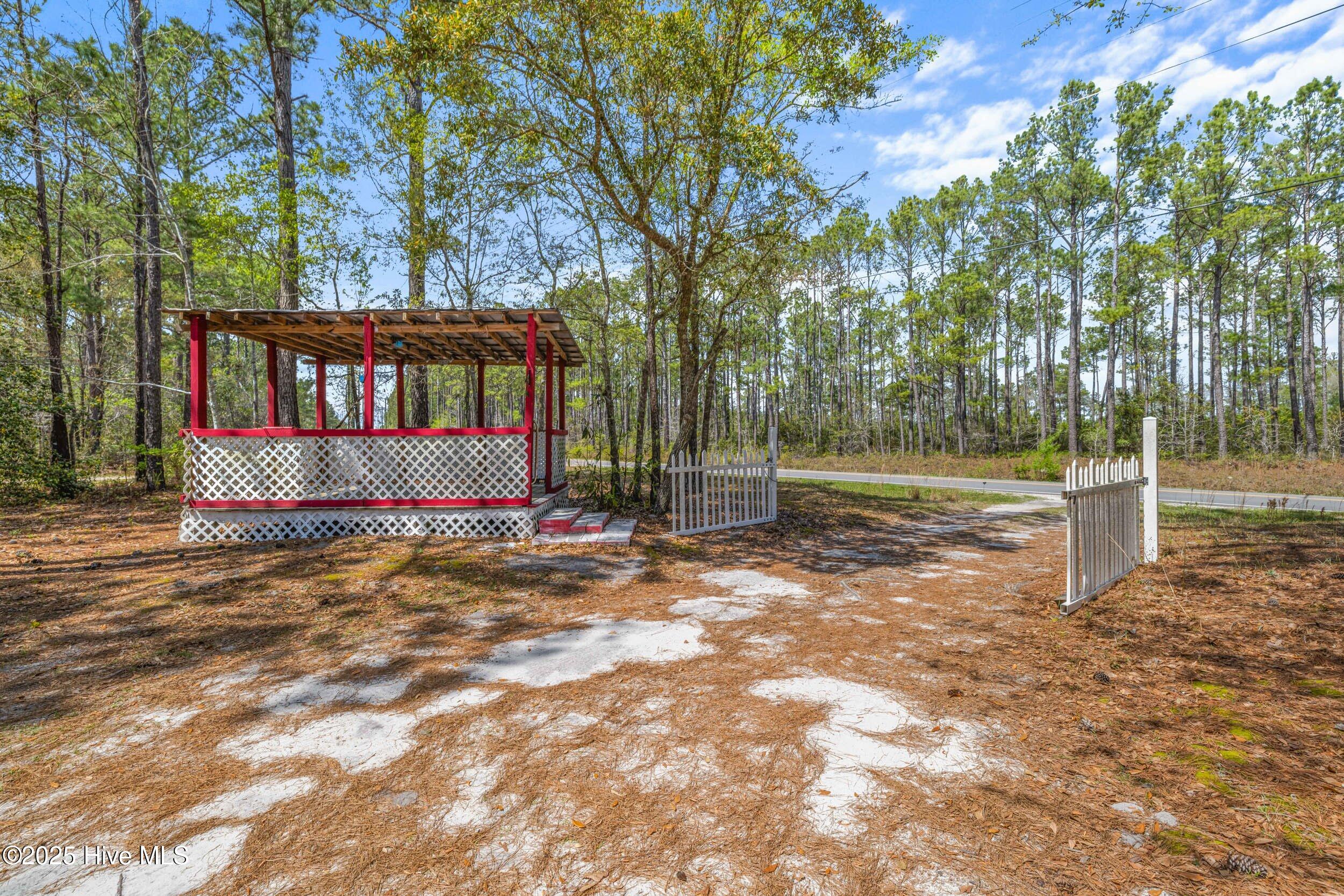 360 Old Folkstone Road Holly Ridge, NC 28445 - Photo 3 of 52 025A7674