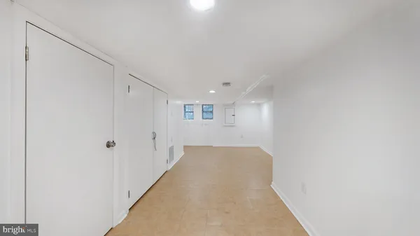 a picture of a bathroom with mirror