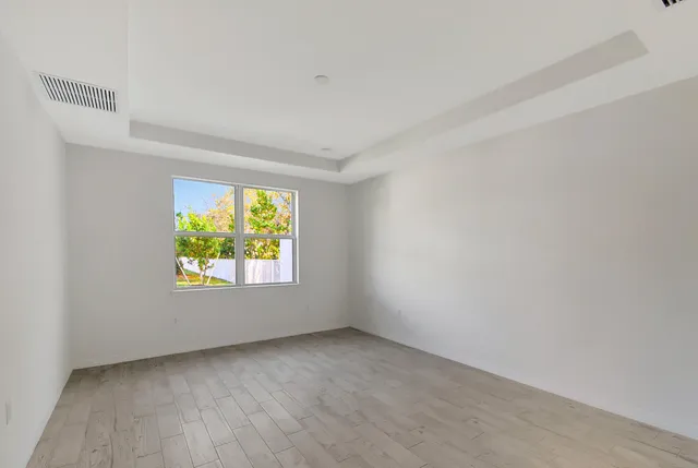 an empty room with windows