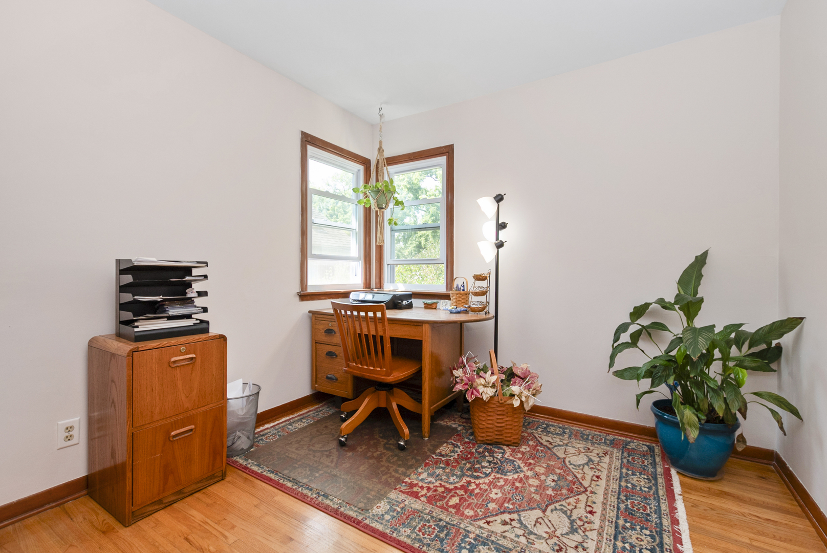 10832 Carpenter Street Mokena, IL 60448 - Photo 13 of 17 a view of a workspace with furniture and a potted plant