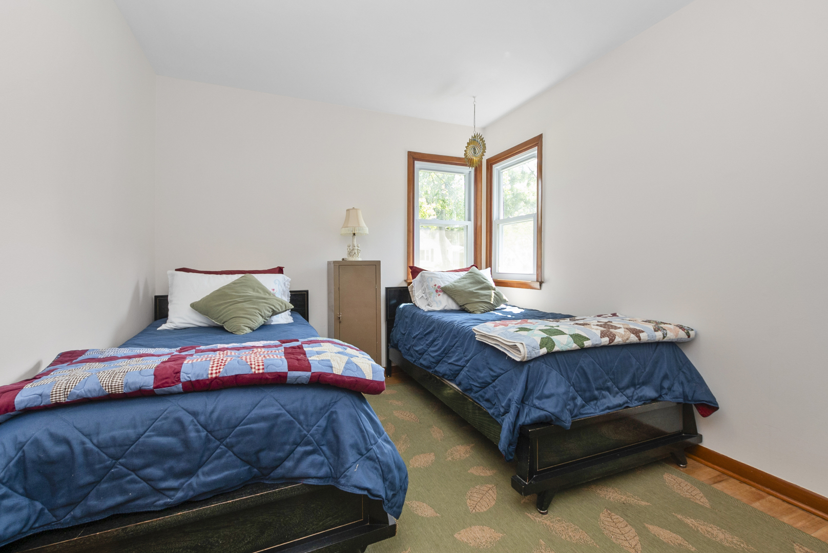 10832 Carpenter Street Mokena, IL 60448 - Photo 14 of 17 a bedroom with a bed and window