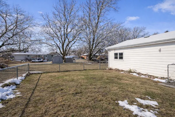a view of yard with trees