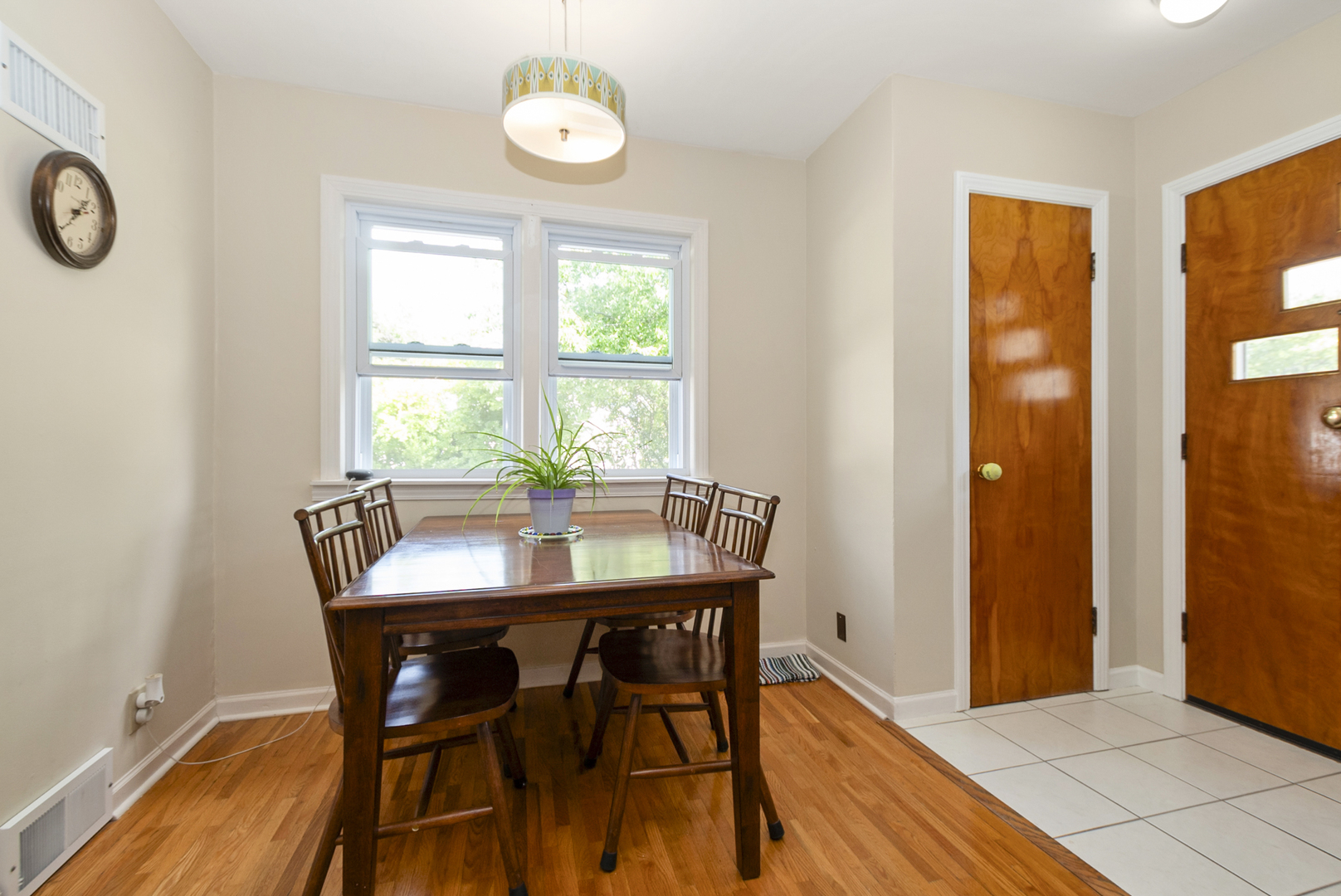 10832 Carpenter Street Mokena, IL 60448 - Photo 6 of 17 a view of a dining room with furniture and window