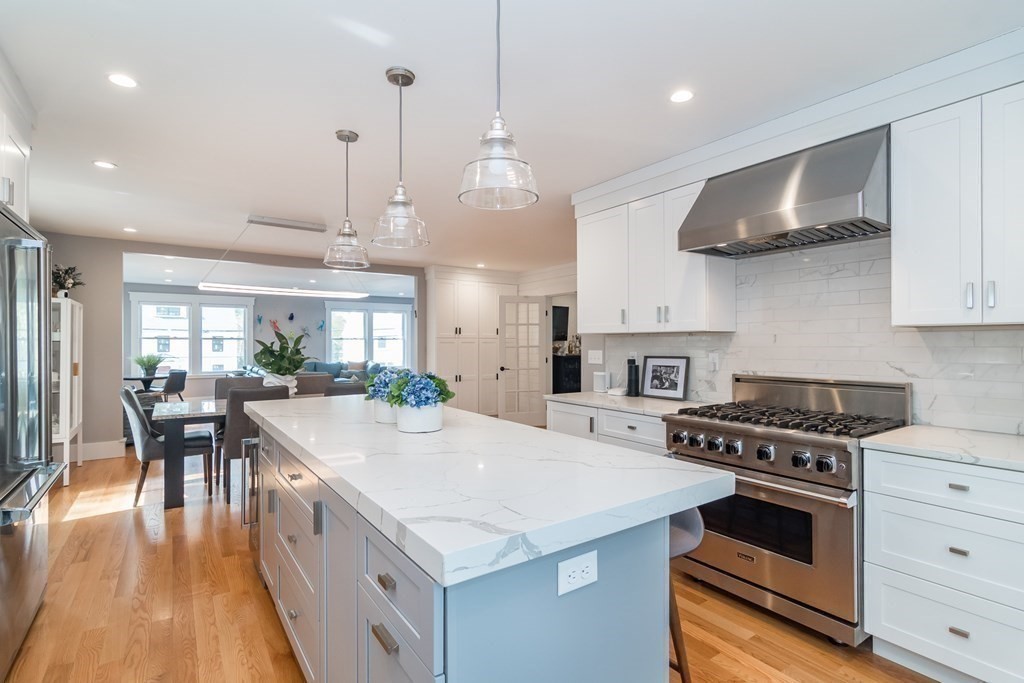 1 Crown Ridge Road Wellesley, MA 02482 - Photo 11 of 32 a kitchen with a stove and a wooden floor