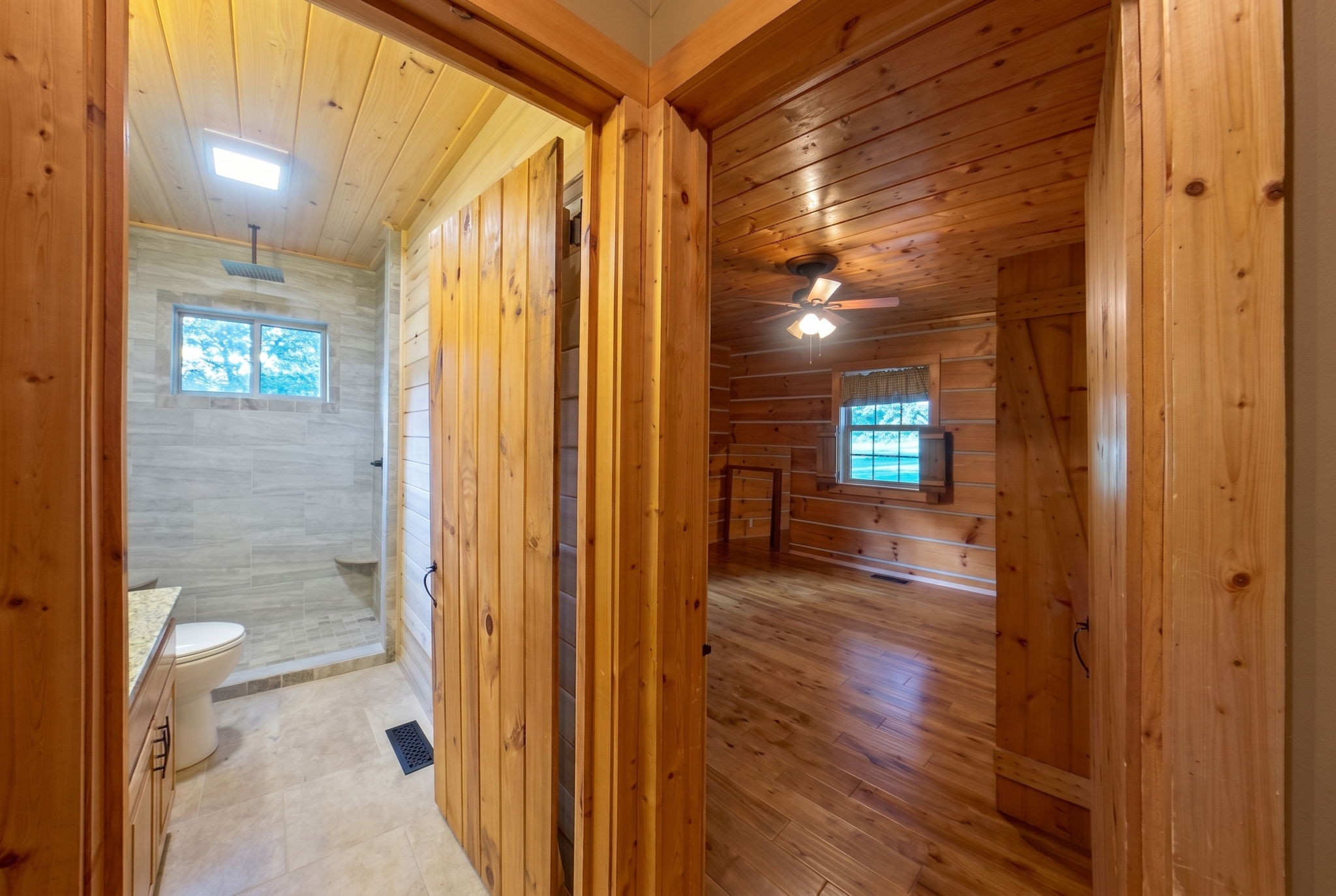 2909 B Beech Log Road Watertown, TN 37184 - Photo 26 of 67 a view of a hallway with wooden floor and a bathroom