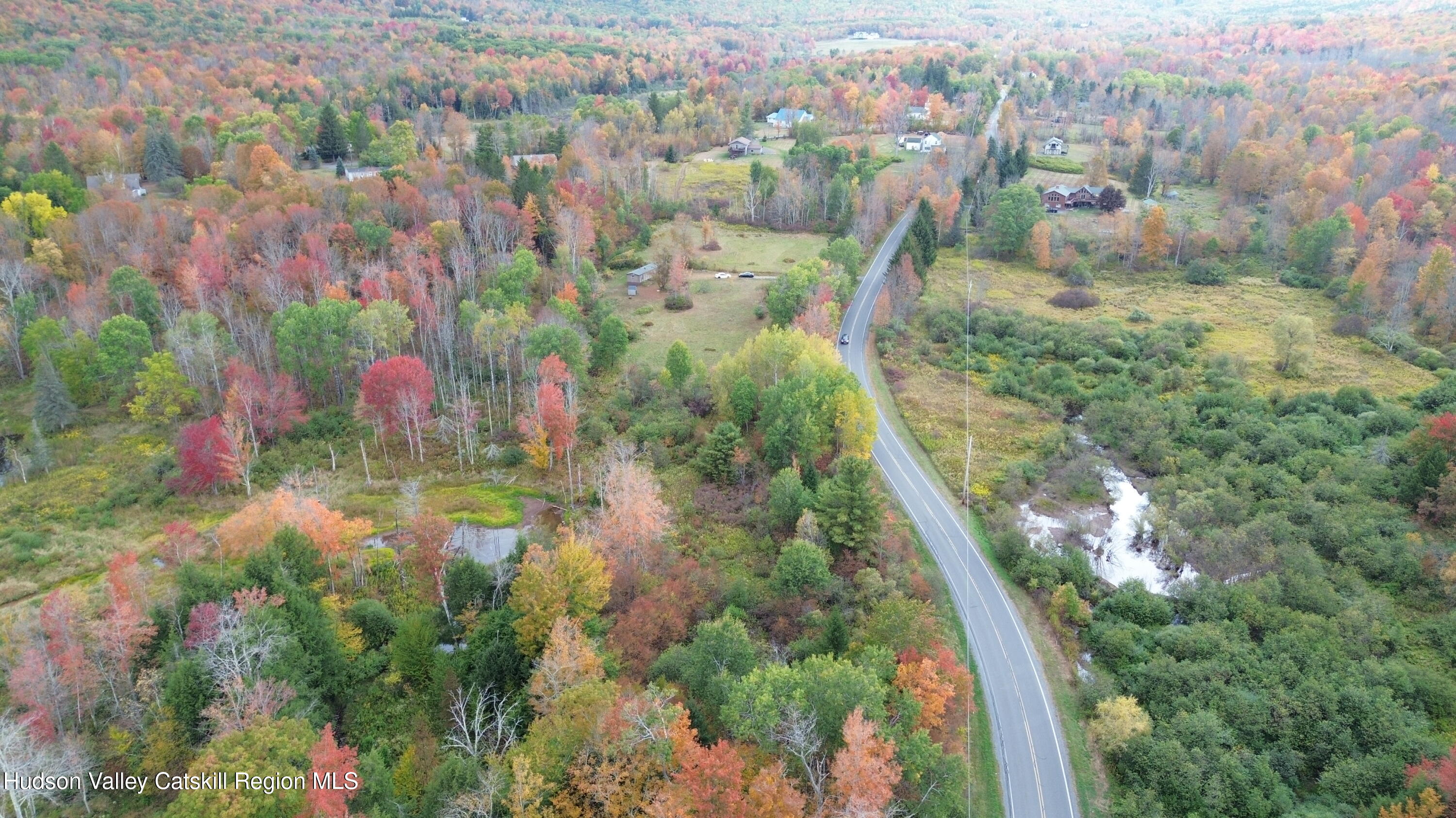 611 Mitchell Hollow Road Windham, NY 12496 - Photo 8 of 11 an aerial view of residential houses with outdoor space and trees