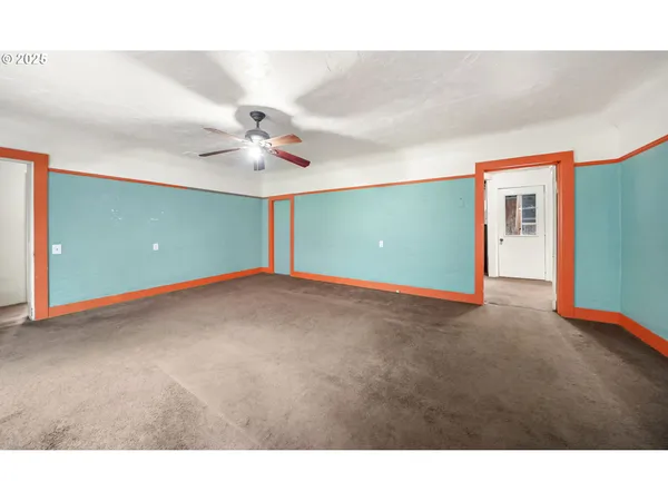 a view of an empty room with window