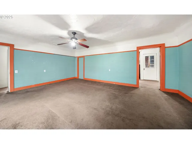 a view of an empty room with window