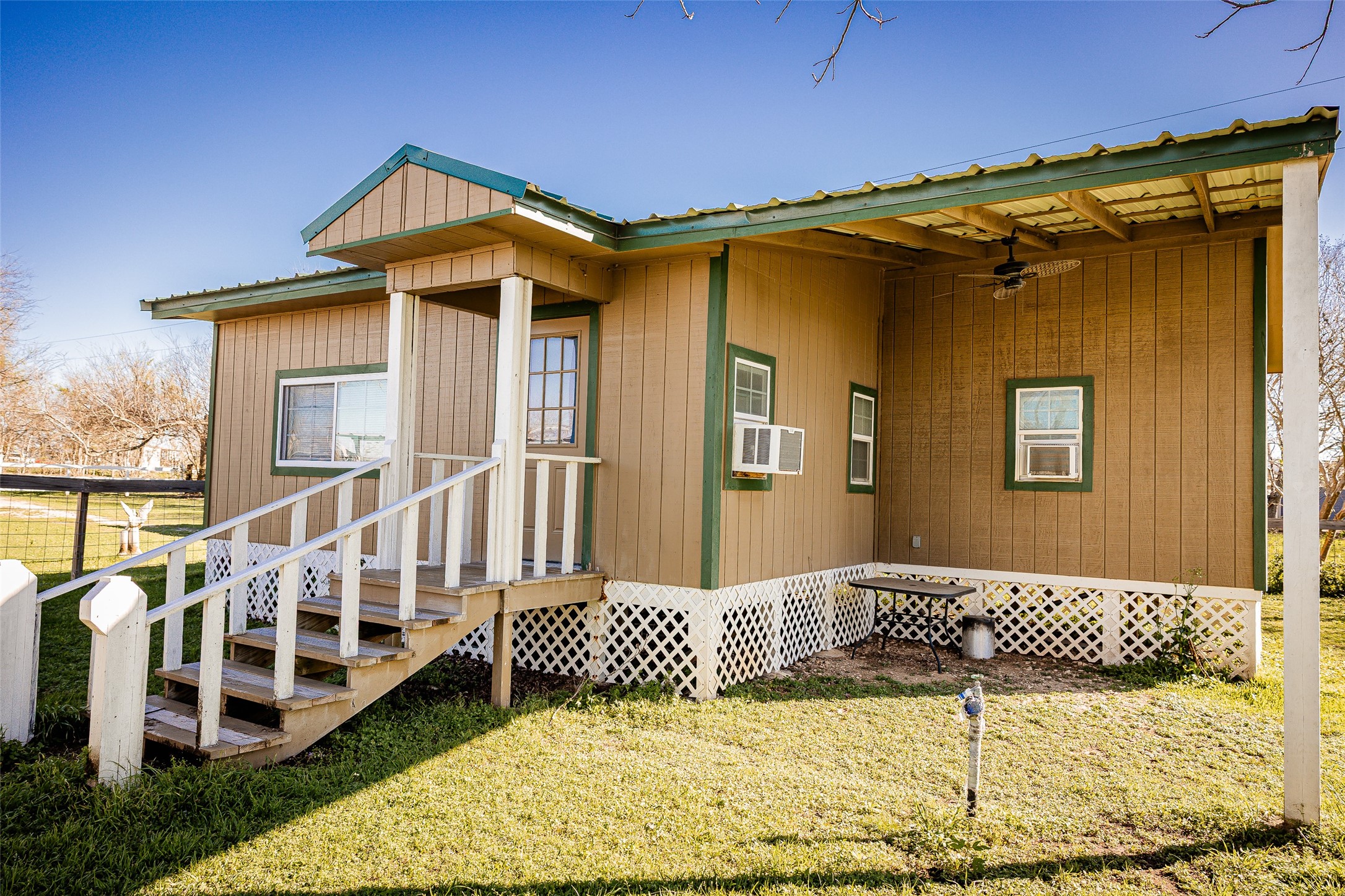 8608 Captain Scott Road Brenham, TX 77833 - Photo 21 of 28 a front view of a house with a balcony