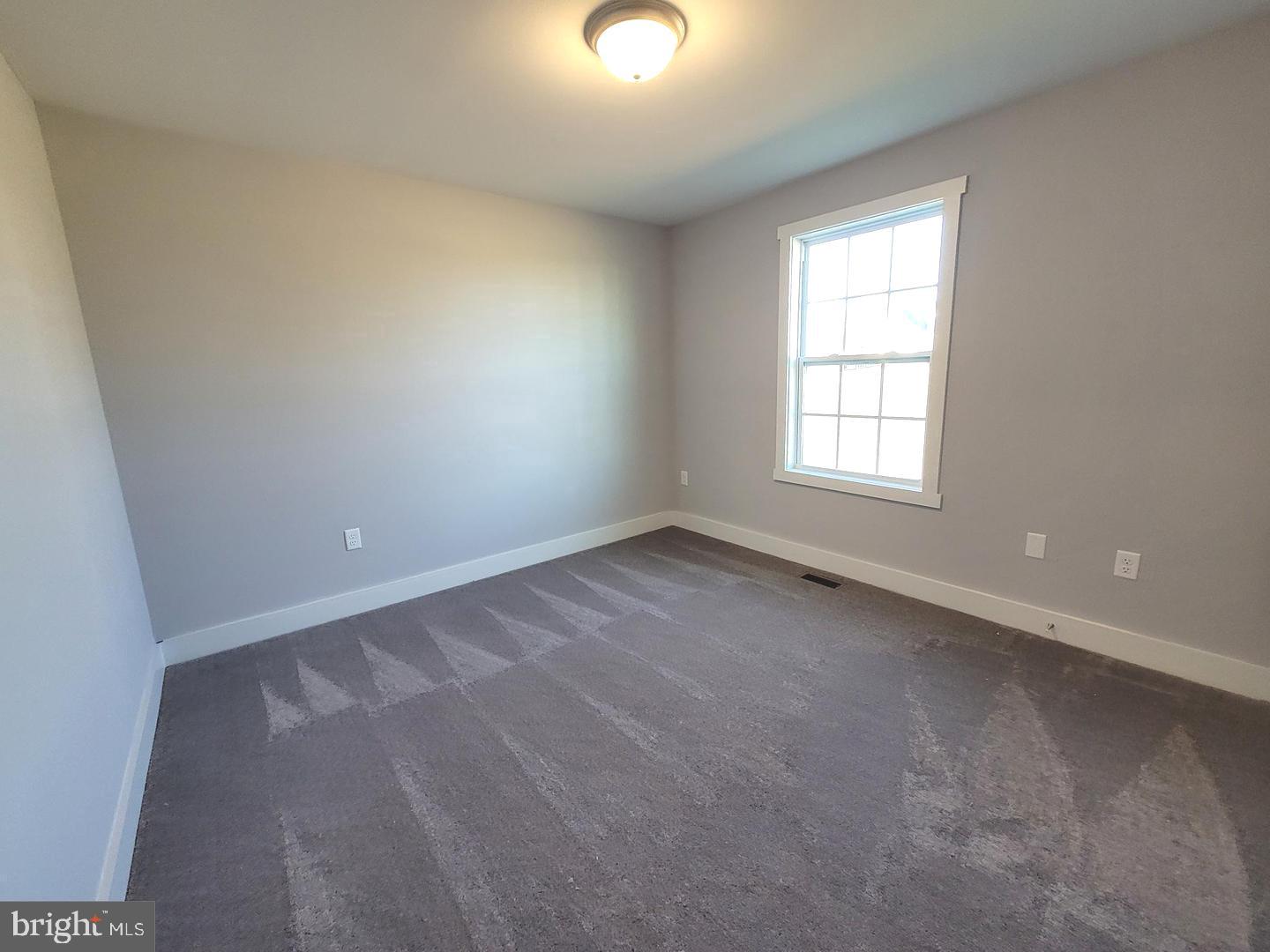 Plum Tree Lane Berkeley Springs, WV 25411 - Photo 13 of 18 an empty room with windows