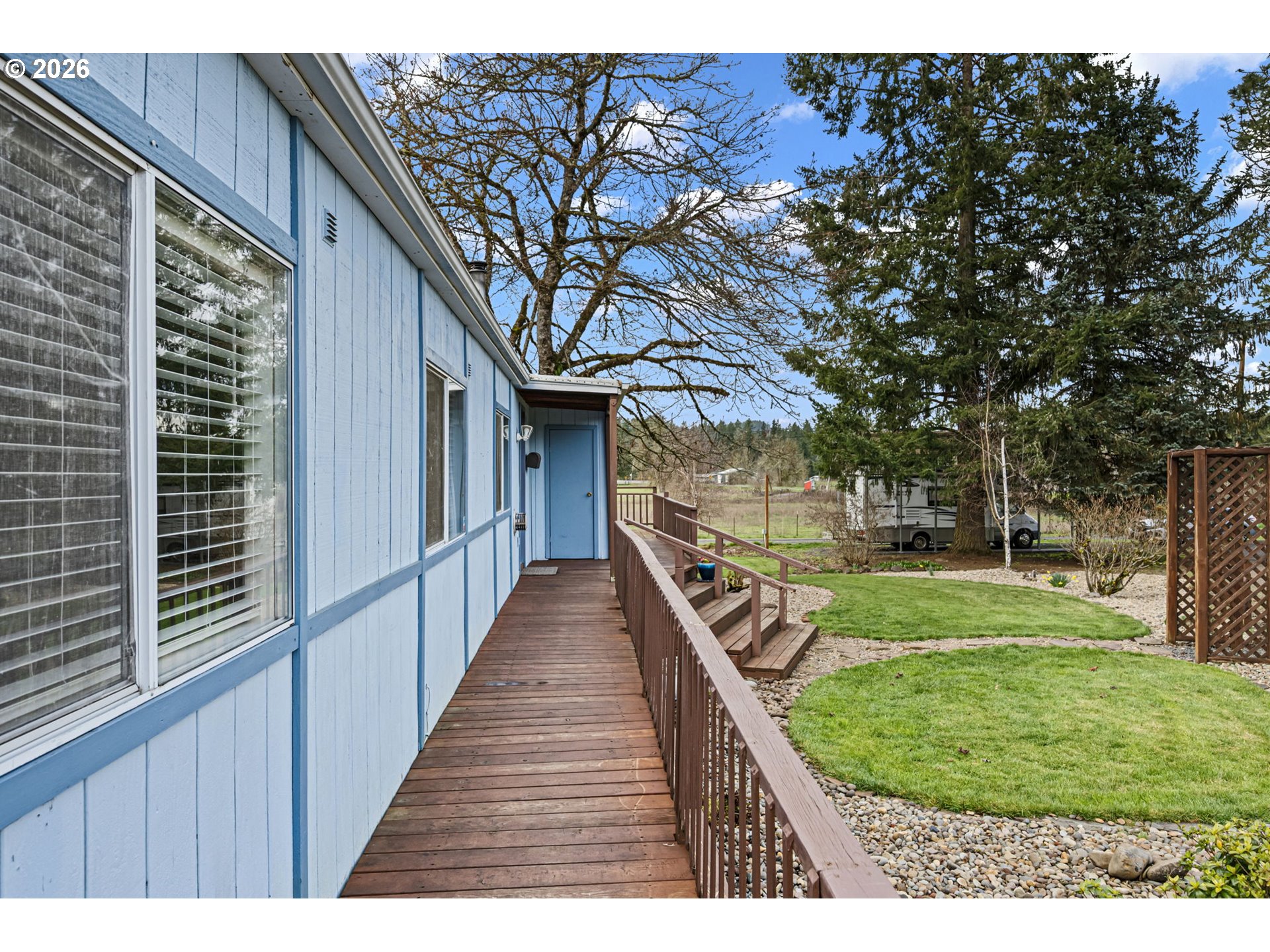 82073 Lost Creek Road Dexter, OR 97431 - Photo 11 of 47 a view of a backyard with wooden fence