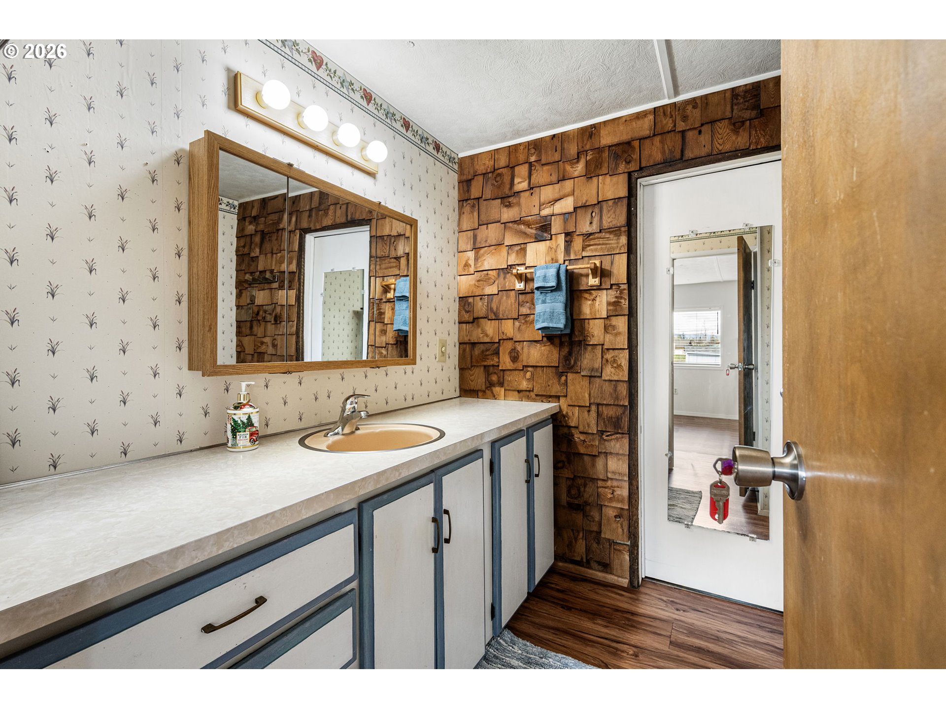 82073 Lost Creek Road Dexter, OR 97431 - Photo 31 of 47 a bathroom with a sink and a mirror