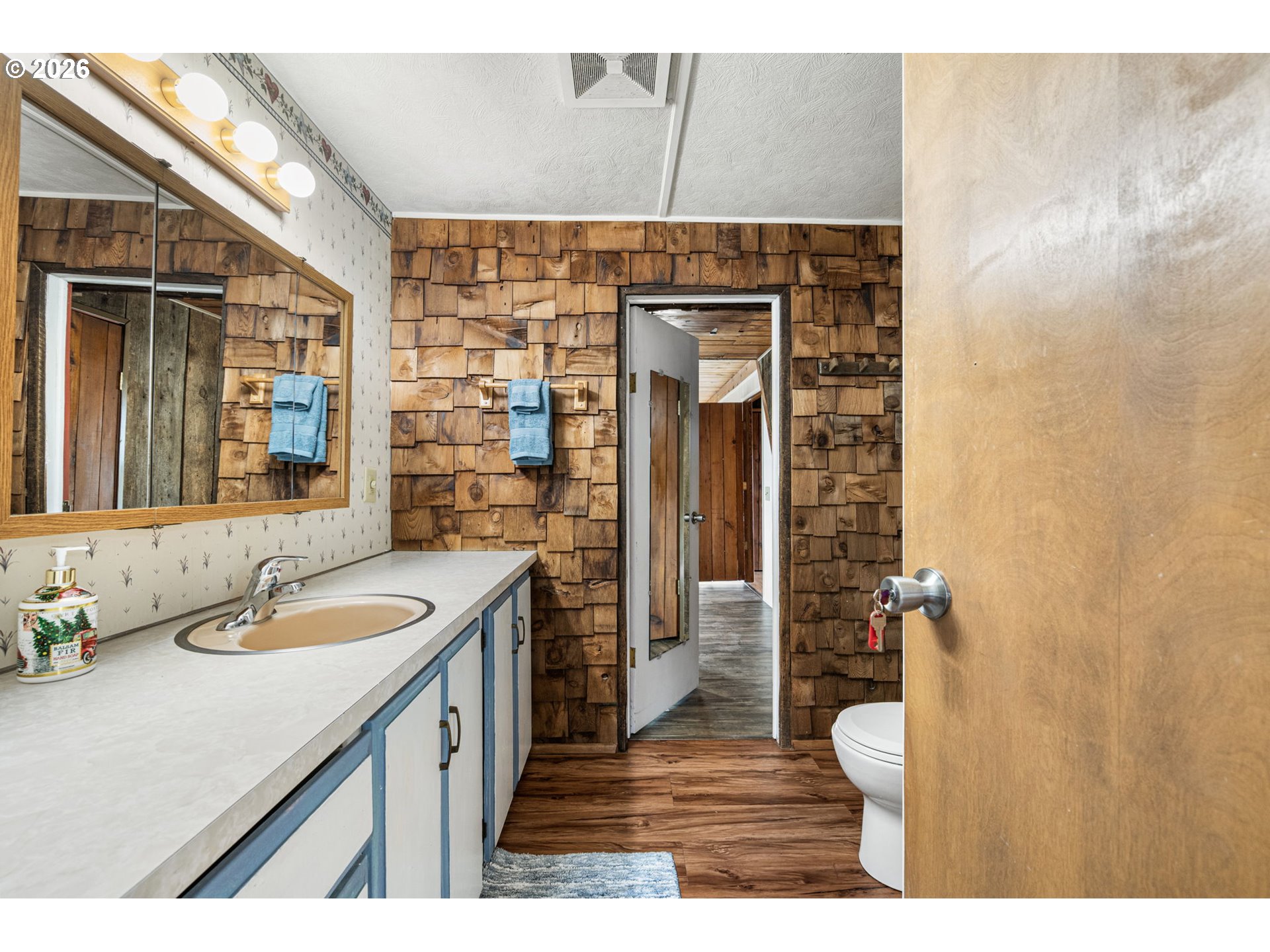 82073 Lost Creek Road Dexter, OR 97431 - Photo 32 of 47 a bathroom with a sink and a mirror