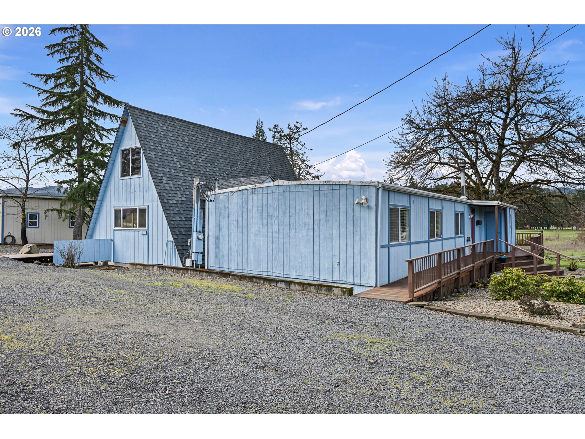 82073 Lost Creek Road Dexter, OR 97431 - Photo 10 of 47 a view of a house with backyard and trees