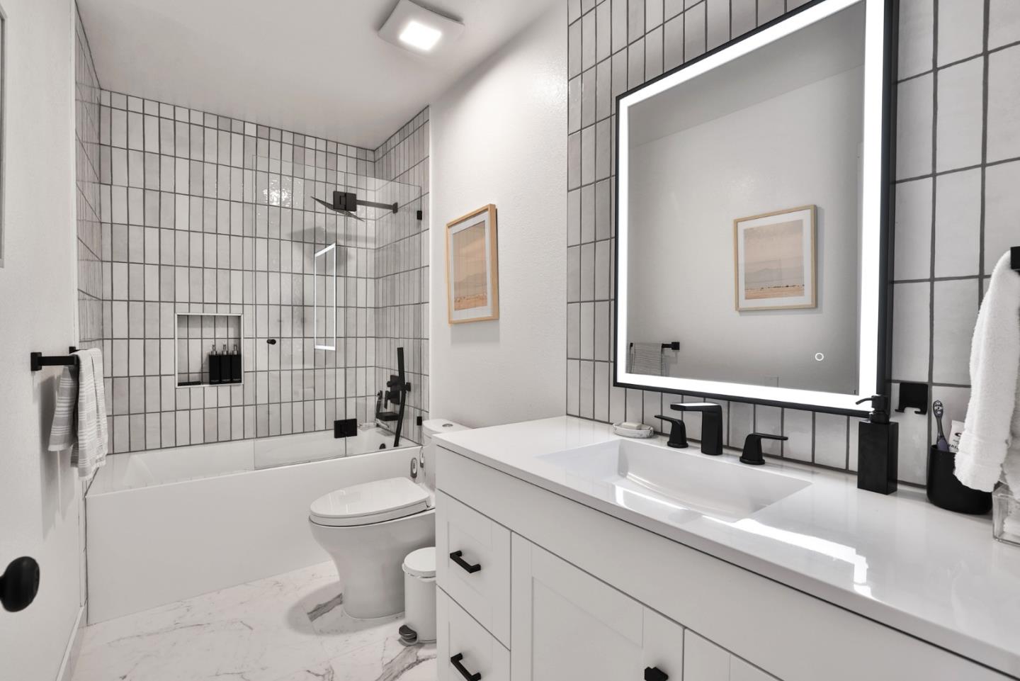 4966 Bridgepointe Place Union City, CA 94587 - Photo 16 of 19 a bathroom with a sink a toilet and shower