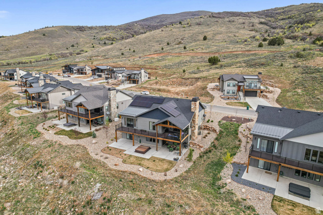 4527 North Seven Bridges Road Eden, UT 84310 - Photo 4 of 65 Aerial view of residential area featuring mountains