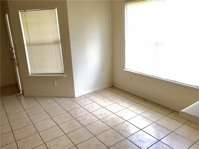 2808 Southampton Way, Unit A Round Rock, TX 78664 - Photo 11 of 16 a view of an empty room and window