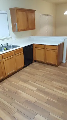 a view of a refrigerator in bathroom
