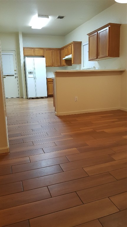 2808 Southampton Way, Unit A Round Rock, TX 78664 - Photo 6 of 16 a view of a refrigerator in bathroom