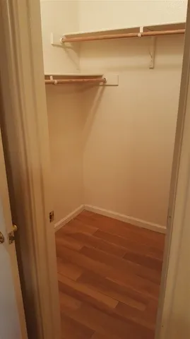 a kitchen with a stove and a refrigerator