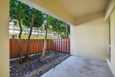 a view of a backyard with garden