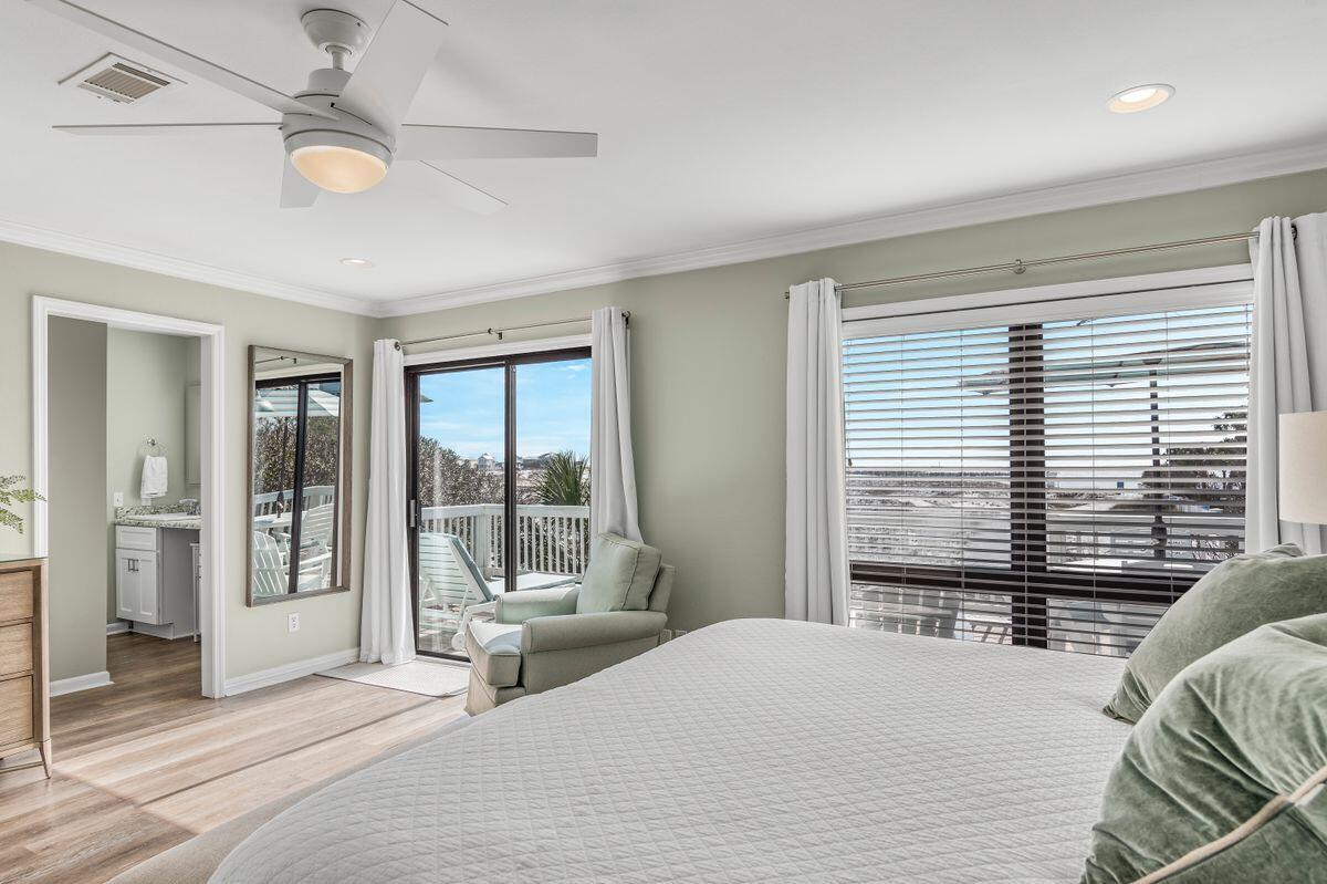 320 Gulf Shore Drive Destin, FL 32541 - Photo 17 of 46 a bedroom with a large bed and a large window