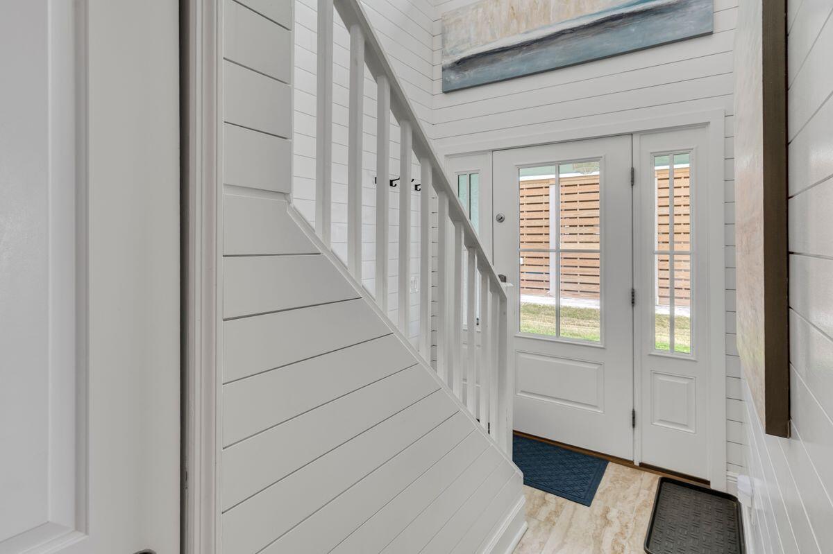 320 Gulf Shore Drive Destin, FL 32541 - Photo 32 of 46 a view of entryway with wooden floor and stairs
