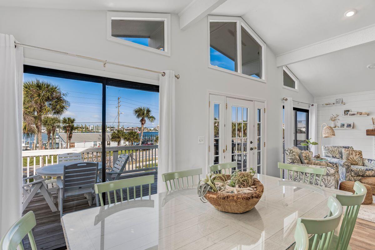 320 Gulf Shore Drive Destin, FL 32541 - Photo 8 of 46 a living room with a couch and a large window
