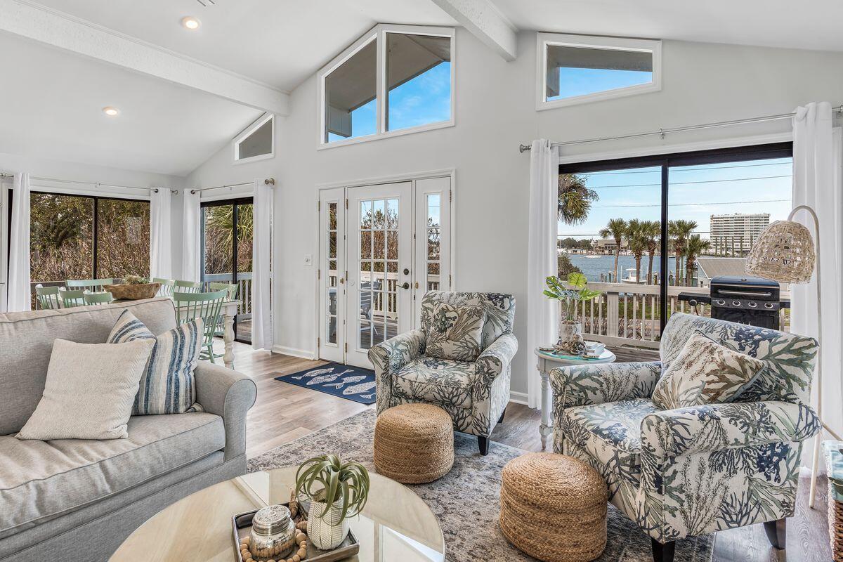 320 Gulf Shore Drive Destin, FL 32541 - Photo 9 of 46 a living room with furniture and a large window