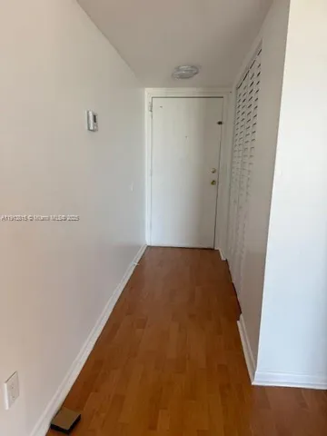 a bathroom with a small window