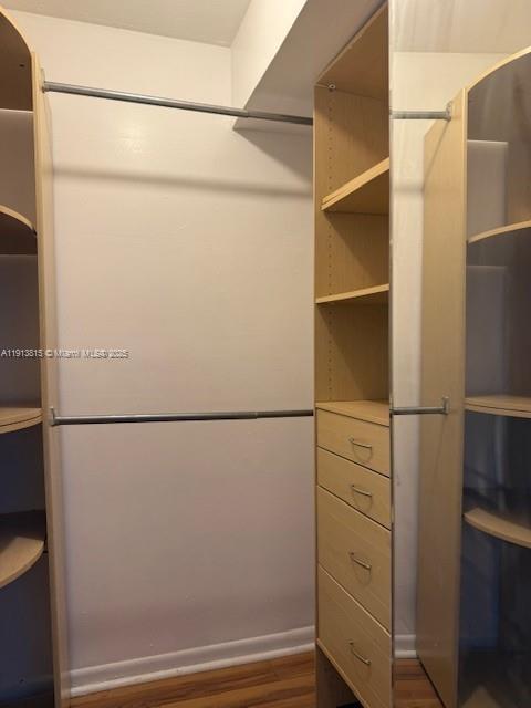 2350 Northeast 135th Street, Unit 711 North Miami, FL 33181 - Photo 8 of 10 a view of a walk in closet