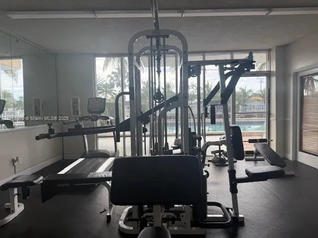 a view of swimming pool with a table and chairs