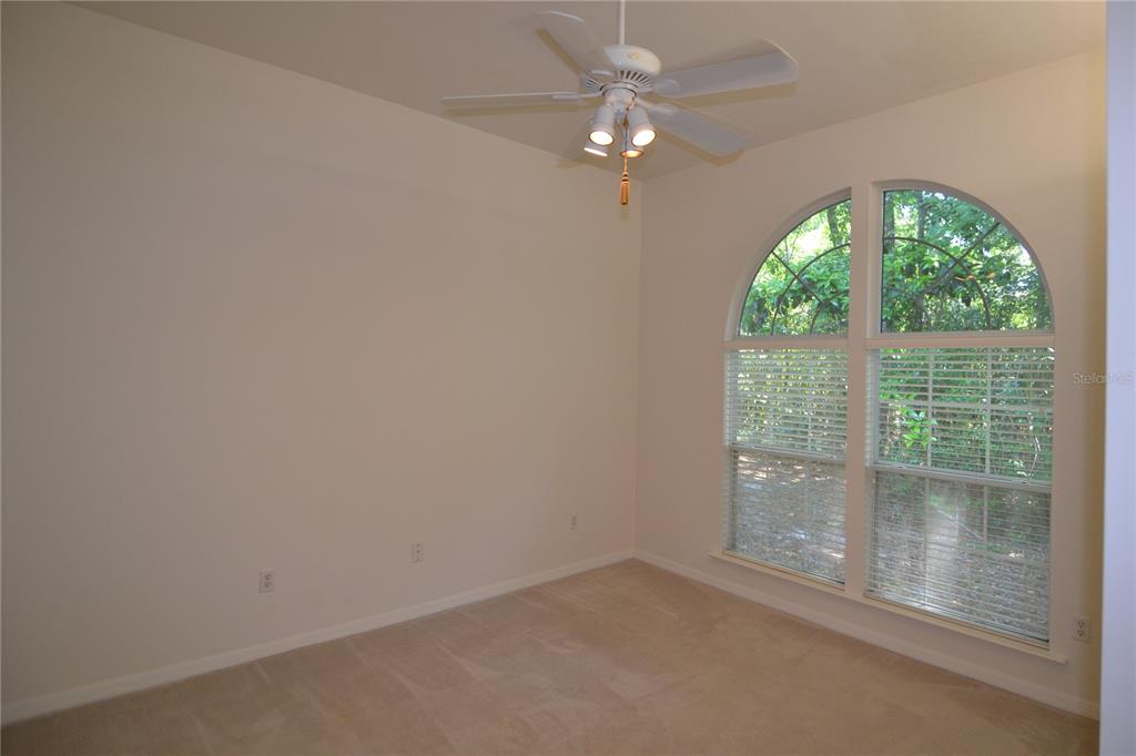 79 Northwest 48th Boulevard Gainesville, FL 32607 - Photo 13 of 30 an empty room with a large window