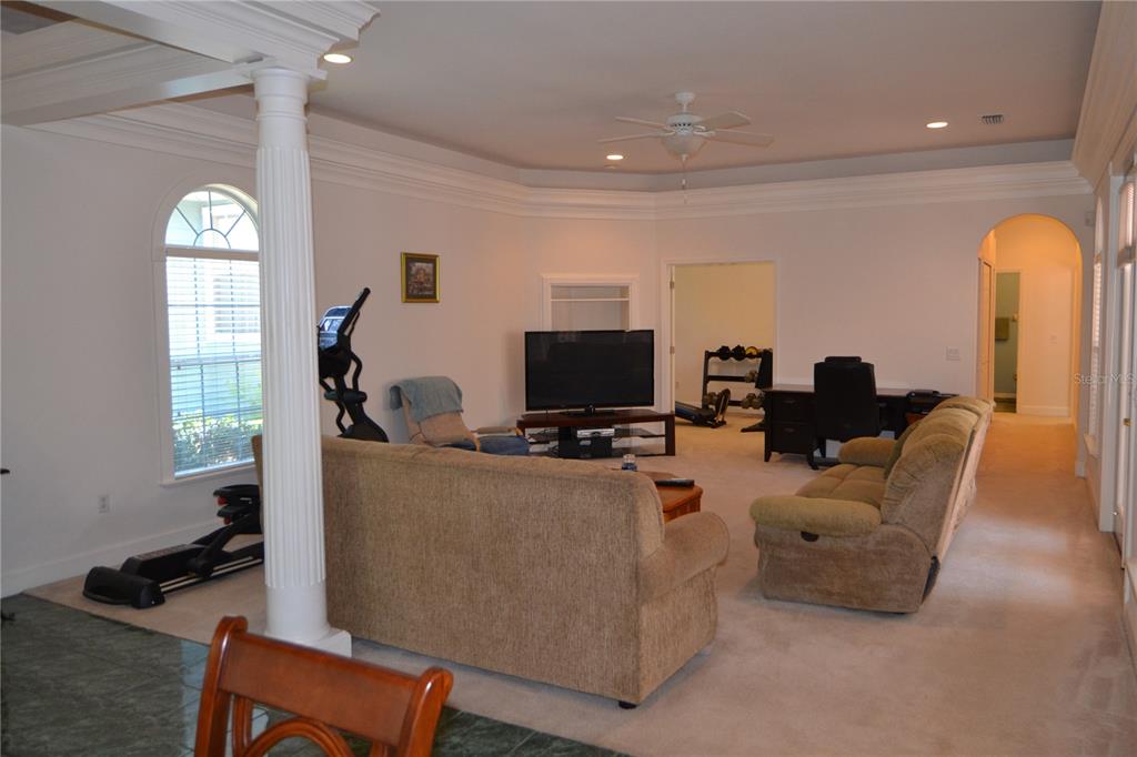 79 Northwest 48th Boulevard Gainesville, FL 32607 - Photo 21 of 30 a living room with furniture and a flat screen tv