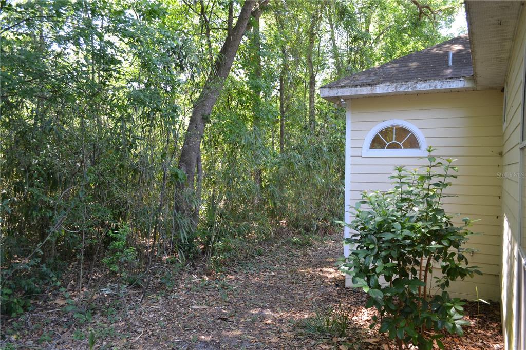 79 Northwest 48th Boulevard Gainesville, FL 32607 - Photo 30 of 30 a view of a house with a yard