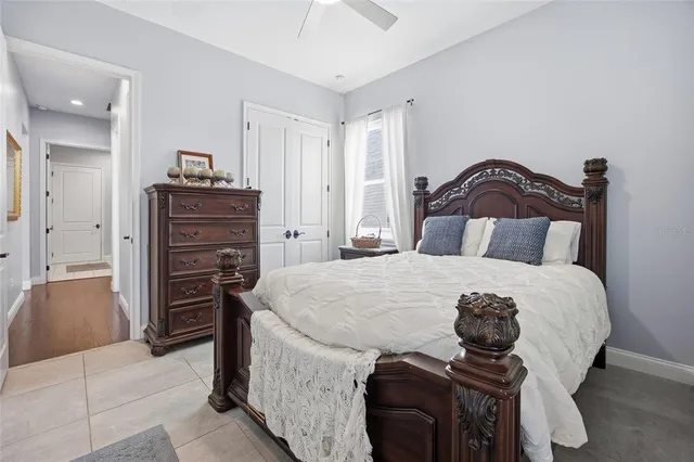 a bedroom with a bed and dresser