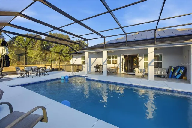 a view of a lake with houses in the back