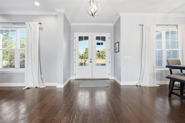 a view of livingroom with hardwood floor and a window
