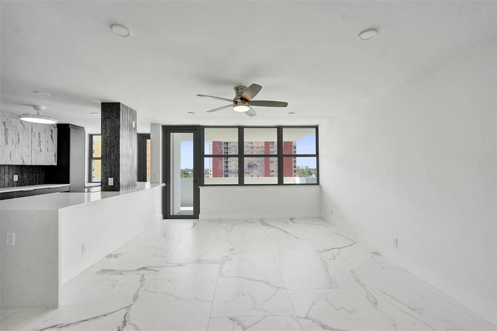 1390 South Ocean Boulevard, Unit 5C Pompano Beach, FL 33062 - Photo 16 of 35 a view of an empty room with a window