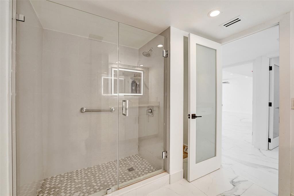 1390 South Ocean Boulevard, Unit 5C Pompano Beach, FL 33062 - Photo 26 of 35 a bathroom with a shower