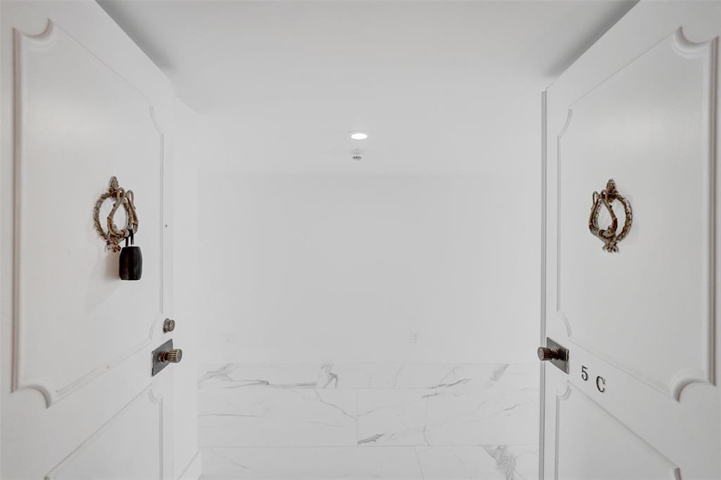 1390 South Ocean Boulevard, Unit 5C Pompano Beach, FL 33062 - Photo 7 of 35 a bathroom with a shower