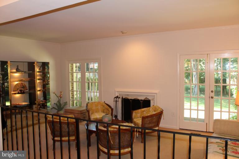 7312 Greentree Road Bethesda, MD 20817 - Photo 14 of 21 French doors in living room opens to back yard