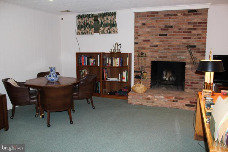 7312 Greentree Road Bethesda, MD 20817 - Photo 9 of 21 Family Room w/raised hearth fireplace